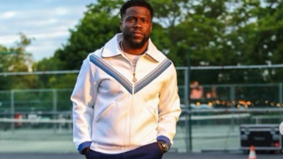 Kevin Hart in a wheelchair, injured after abdominal muscle tears