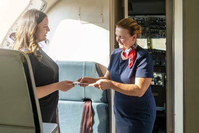 Airline rewards staff with a bonus worth more than $7,000 after posting a record profit - and even its customers can cash in