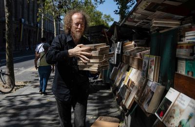 Paris booksellers won't let their street stands along the Seine be removed for the 2024 Olympics
