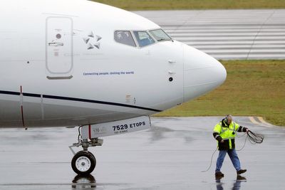 Federal officials are warning airlines to keep workers away from jet engines that are still running