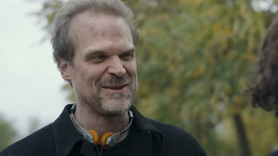 David Harbour Explains Why He Fought For His Gran Turismo Character To Listen To Black Sabbath Over Guns N' Roses