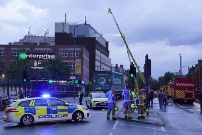 Firefighters tackle huge blaze at east London building with flats - old