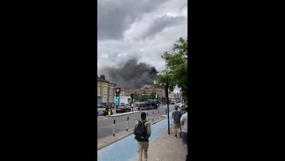 Huge fire causes widespread damage to building in east London as 100 firefighters called to blaze