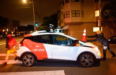 Armed with traffic cones, protesters are immobilizing driverless cars
