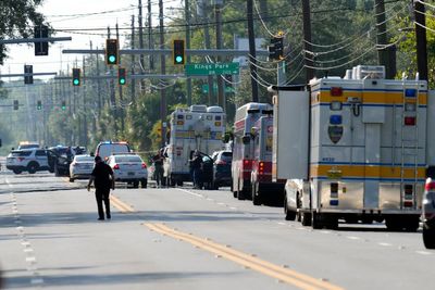 White gunman killed three victims in Florida with assault rifle covered in Nazi swastikas