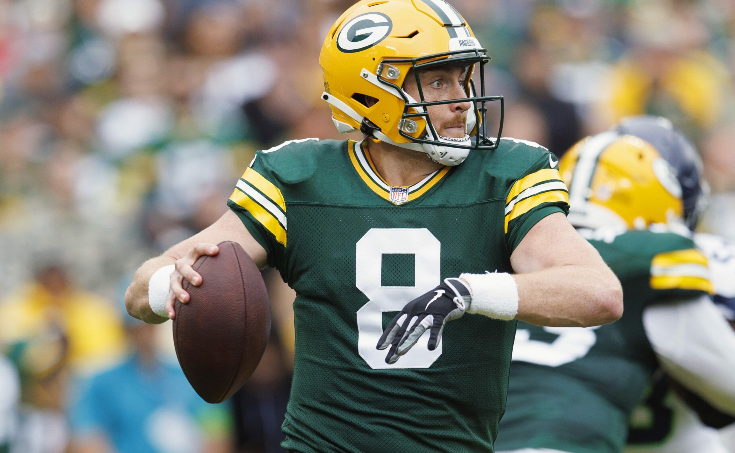 Packers QB Sean Clifford fine after exiting game with