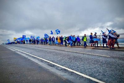 Independence supporters march over the sea to Skye as part of AUOB rally