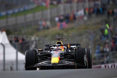 F1 Dutch GP: Verstappen fends off Alonso in red-flagged, rain hit race