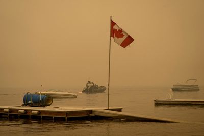 Some wildfire evacuations end in British Columbia, but fire threatens community farther north