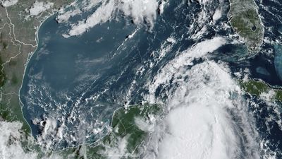 Idalia strengthens into a hurricane off Cuba as it churns toward Florida