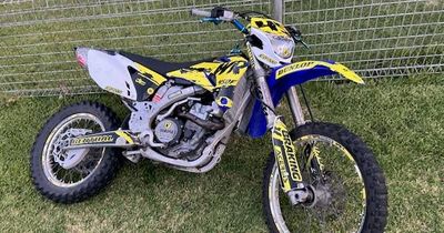 Dirt bike rider on the run after crashing into car, punching driver