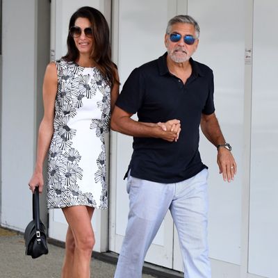 Amal and George Clooney Color Coordinate in Navy and White (and Sunglasses) for Their Arrival in Venice