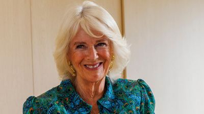 Queen Camilla looks 'beautiful' as she rocks signature style and a 'glowing' tan