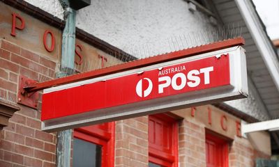 Australia Post reports $200m annual loss, its first since 2015, amid push to close city branches