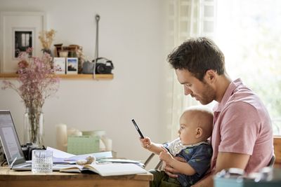 Standard Chartered fights for top banking talent with 20 weeks of paid leave for new dads