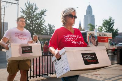 Opponents of Nebraska plan to use public money for private school tuition seek ballot initiative