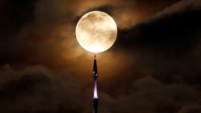The last blue supermoon until 2037 will rise tonight. Here's how to watch.