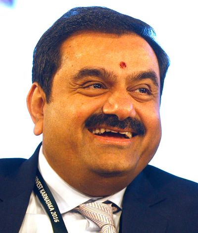 Report says close associates of India's Adani Group secretly purchased large numbers of shares