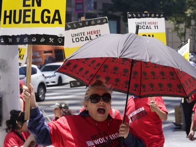 Political scientists confront real world politics dealing with hotel workers strike