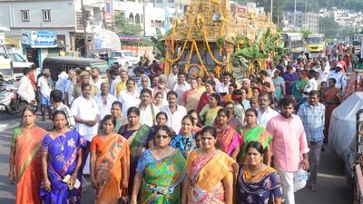 Devotees take part in Giri Pradakshina at Kanaka Durga temple