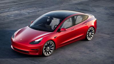 Tesla unveils Model 3 revamp in China, slashes major market prices
