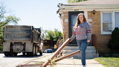 What would you do if trucks kept backing into your house? Past tenant moved out but current North Side homeowner is hoping to stay