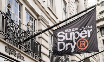 Superdry reports £148m loss as cost of living crisis affects recovery plans