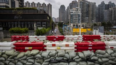 Hong Kong hunkers down as Super Typhoon Saola barrels toward southern China