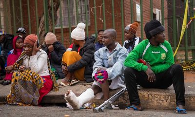 Grief and anger after Johannesburg blaze that killed at least 74
