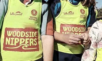 ‘Walking billboard’ for Woodside: parents want end to fossil fuel company sponsorship of WA Nippers