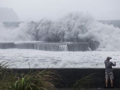 Taiwan suspends work, transport and classes as Typhoon Haikui slams into the island