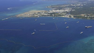 Japan's top court orders Okinawa to allow a divisive government plan to build US military runways
