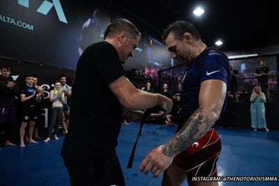 Conor McGregor awarded Brazilian jiu-jitsu black belt by SBG Ireland coach John Kavanagh