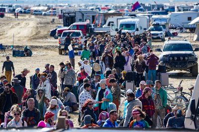 Burning Man revellers ‘lash out’ at each other during exodus from washout festival