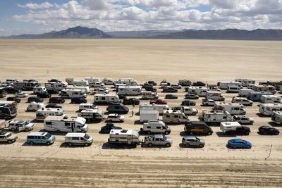 Burning Man festival attendee’s suspected cause of death revealed as mass exodus continues – live
