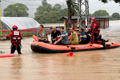 Tens of thousands evacuated in China amid rain from waning Typhoon Haikui