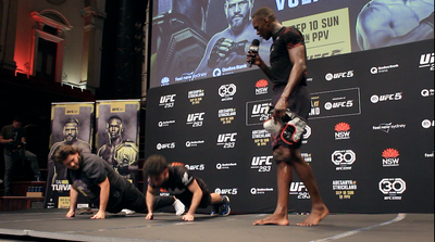 Video: Israel Adesanya cracks pads at UFC 293 open workouts, includes fans in pushup contest