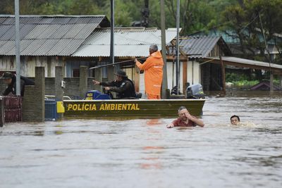 A cyclone has killed over 20 people in Brazil, with more flooding expected