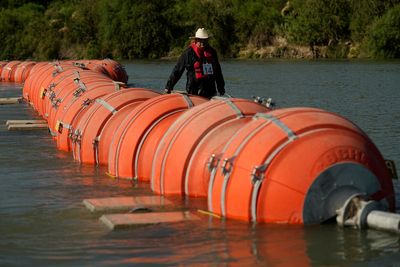 Judge orders Texas officials to remove floating buoys along Rio Grande border
