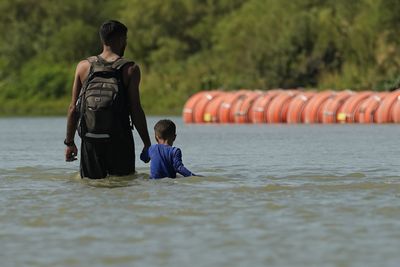 US judge orders Texas to remove controversial border buoys from Rio Grande