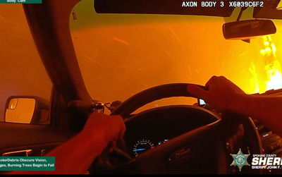 ‘I don’t wanna f*****g die in this!’ Terrifying video shows Washington deputy driving into wildfire inferno