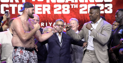 Video: Tyson Fury (shirtless), Francis Ngannou (shirt on) have spirited first faceoff at kickoff presser