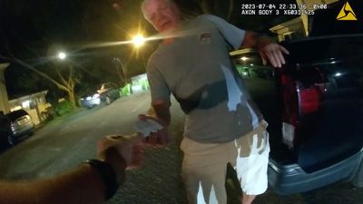 Body cam shows prolific federal drug prosecutor offering cops business card in DUI crash arrest