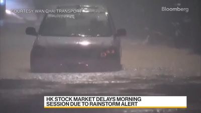 Hong Kong swamped by record rain flooding roads and subway stations