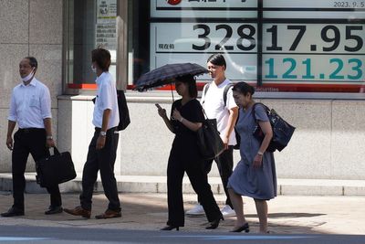 Stock market today: Asian shares weaken while Japan reports economy grew less than expected