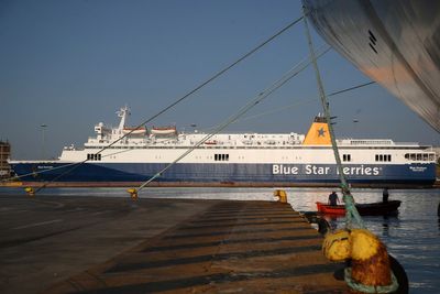 Greek ferry crews call a strike over work conditions after the death of a passenger pushed overboard