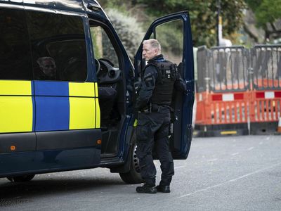 Police catch a terrorism suspect who escaped from a London prison