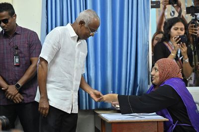 Maldives presidential runoff is set for Sept. 30 with opposition in surprise lead but short of mark