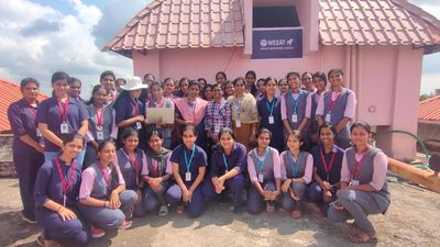 Students of LBS Institute of Technology for Women building a satellite