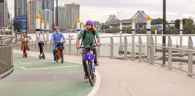 Five years on, Brisbane's e-scooters and e-bikes are winning over tourists and residents as they open up the city